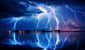 Thunderstorm over the lake at night. Dramatic sky and lightning. Royalty Free Stock Photo