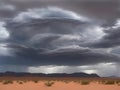 Thunderstorm over the mountains in a desert area