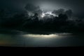 A thunderstorm over the northern plains in the USA is lit by lightning during blue hour. Royalty Free Stock Photo