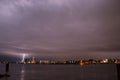 Thunderstrikes over the Rotterdam Skyline at river Nieuwe Maas in the Netherlands. Royalty Free Stock Photo