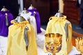 Thurible for incense decorated with yellow and purple fabric. Royalty Free Stock Photo