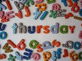 Thursday banner with colorful lower case letters