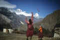 Young Buddhist monks playing frisbee Royalty Free Stock Photo