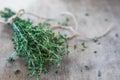 Thyme bunch. Bundle of fresh thymes on a wooden background Royalty Free Stock Photo