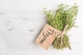 Thyme fresh herbs close-up, on a light background.