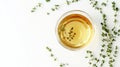 The thyme herbal tea is shown from above with plenty of space for text Royalty Free Stock Photo
