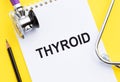 THYROID. Text write on medical notebook with stethoscope Royalty Free Stock Photo