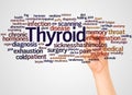 Thyroid word cloud and hand with marker concept Royalty Free Stock Photo