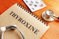 Thyroxine hormone in the notepad and stethoscope