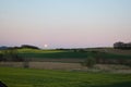 ThÃÂ¼r, Germany - 04 14 2022: Full moon aboce Eifel landscape in spring