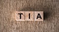 TIA Transient Ischemic Attack acronym in cubes on wooden background Royalty Free Stock Photo