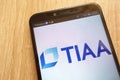 TIAA logo displayed on a modern smartphone