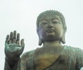 Tian Tan Buddha giant statue, raising his hand , giving blessings Royalty Free Stock Photo