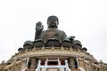 Tian Tan Buddha is a large bronze statue of Buddha Shakyamuni, completed in 1993, and located at Ngong Ping, Lantau Island, in Hon Royalty Free Stock Photo