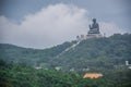 Tian Tan Buddha statue up on mountain, Ngong Ping village, Lantau Island, Hong Kong Royalty Free Stock Photo