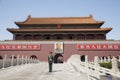 Tiananmen Square, Gate of Heavenly Peace with Mao's Portrait and guard, Beijing, China.