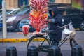 Tianjin, China - Jan 16 2020:  Unidentified street vendor sells traditional Chinese sweet food in a street near the Italian Style Royalty Free Stock Photo