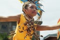 Girl street dancer in various costumes dance at church plaza