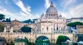 Tiber river bridge with Vatican City and dome of Saint Peter Cathedral - Rome, Italy Royalty Free Stock Photo