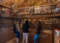 The church attendant talking to visitors in the Church of the Apostles located on the shores of the Sea of Galilee, not far from Royalty Free Stock Photo