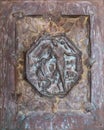 Bas-relief with scenes from the Bible on the massive decorated front door at the entrance to Tabgha - Catholic Church Multiplicat