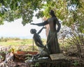 A bronze statue standing in the courtyard of the Church of the Primacy of Saint Peter located on the shores of the Sea of Galilee Royalty Free Stock Photo