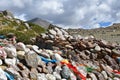 Tibet. Buddhist prayer stones with mantras and ritual drawings on the trail from the town of Dorchen around mount Kailash