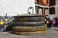 Tibet, Lhasa, China, June, 02, 2018. Large bronze bowl at the walls of the ancient Buddhist monastery jokhang in Lhasa