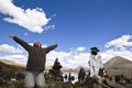 Tibet: man praying with open arms Royalty Free Stock Photo