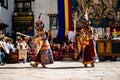 Tibetan Buddhist dancers in traditional demon spirit ghost clothing in Ritual Dance at Tiji Festival