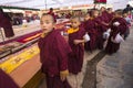 Tibetan Buddhist monks near stupa Boudhanath during festive Puja