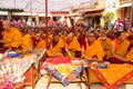 Tibetan Buddhist monks near stupa Boudhanath during festive Puja