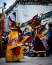 Tibetan Buddhist monks in traditional demon ghost outfit Dancing at the Tiji Festival in Nepal