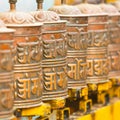 Tibetan Buddhist prayer wheels at Boudhanath stupa in Kathmandu Royalty Free Stock Photo