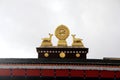 Tibetan Carve on the roof, a deer shaped golden beast and FalunDhammacakka