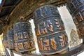 Tibetan copper prayer wheels, Swayambhunath Temple, Kathmandu, Nepal Royalty Free Stock Photo