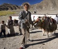 Tibetan farmers with a domesticated Yak - Tibet