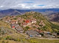 Tibetan Ganden Buddhist Monastery lies in a hilly natural amphitheater Mountains and dramatic views over the valleys near Lhasa