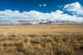 Tibetan highlands and distant snowy mountains near Daotanghe cit Royalty Free Stock Photo