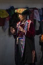 A Tibetan lady in tradition cloth kora the Stupa and praying , Nepal