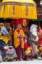 Tibetan lamas dressed in mystical mask dance Tsam mystery in time of buddhist festival at Hemis Gompa, Ladakh, North India