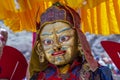 Tibetan man, dressed in a mystical mask, perform a dance during the Buddhist festival in Hemis monastery, Ladakh, India