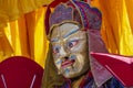 Tibetan man, dressed in a mystical mask, perform a dance during the Buddhist festival in Hemis monastery, Ladakh, India