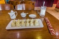 Tibetan meal - momos dumplings and yak mil Royalty Free Stock Photo