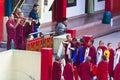 Tibetan monks blew horn in front of Rumtek Monastery for welcoming high level monk near Gangtok. Sikkim, India. Royalty Free Stock Photo