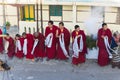 Tibetan monks bowing with frankincense smoke for welcoming high level monk in area of Rumtek Monastery near Gangtok. Sikkim, India Royalty Free Stock Photo