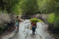 Tibetan people walking on rural road