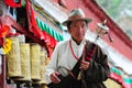 Tibetan pilgrim circles the Potala palace