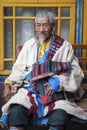 Tibetan Pilgrim inside the Jokhang Temple in Lhasa, Tibet. It is one of the famous Buddhist monasteries in Lhasa Royalty Free Stock Photo