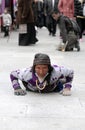 Tibetan pilgrims circle the holy Jokhang monastery